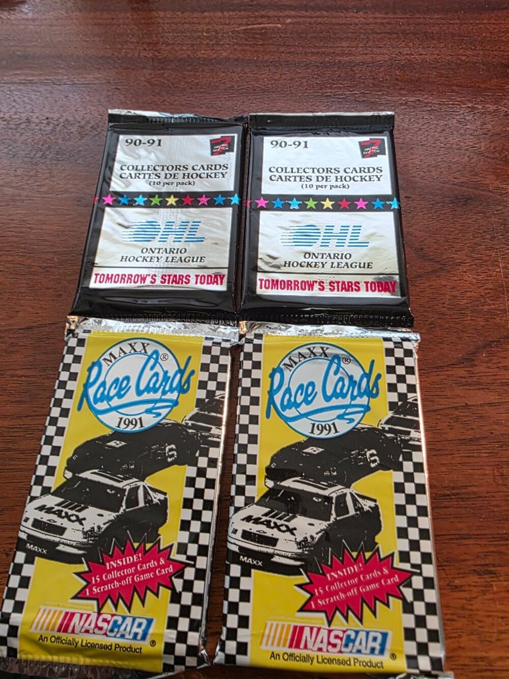 2 SEALED PACKS OF 90/91 HOCKEY AND 2 SEALED PACKS OF 91 RACE TRADING CARDS